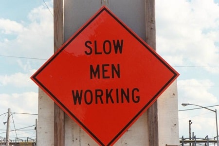 Slow men working